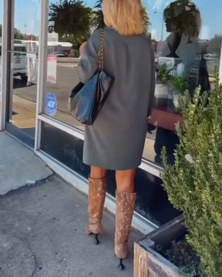 Robe élégante de couleur unie à col rond