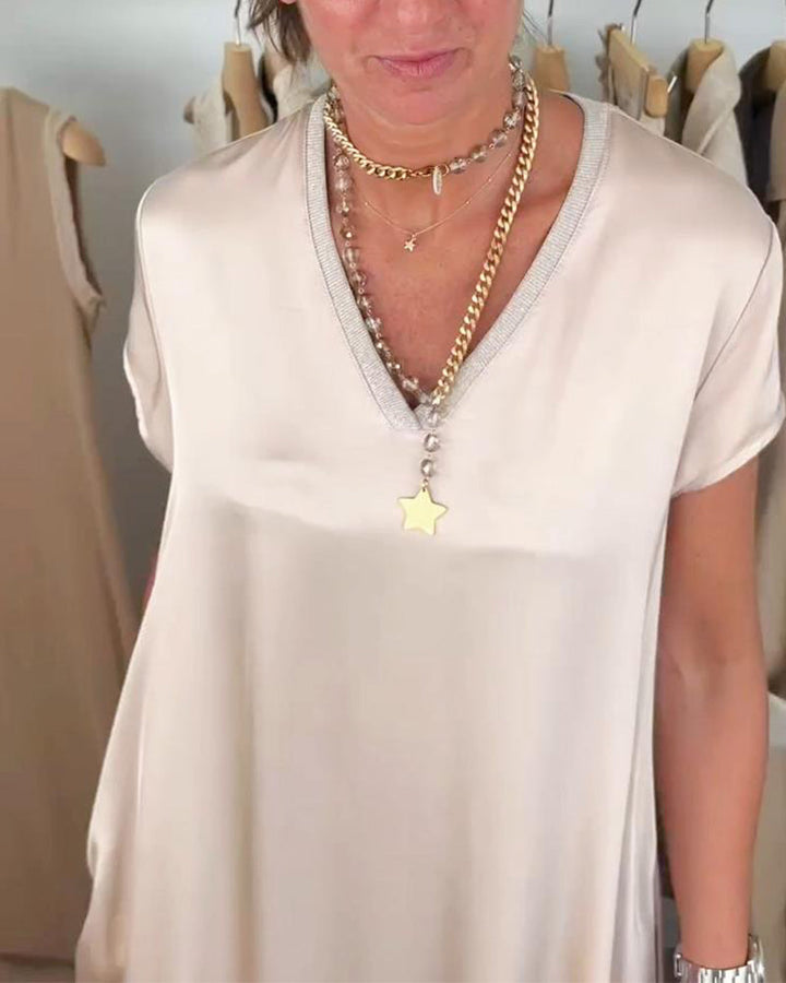 Robe décontractée de couleur unie avec poche et col en V