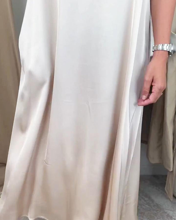 Robe décontractée de couleur unie avec poche et col en V